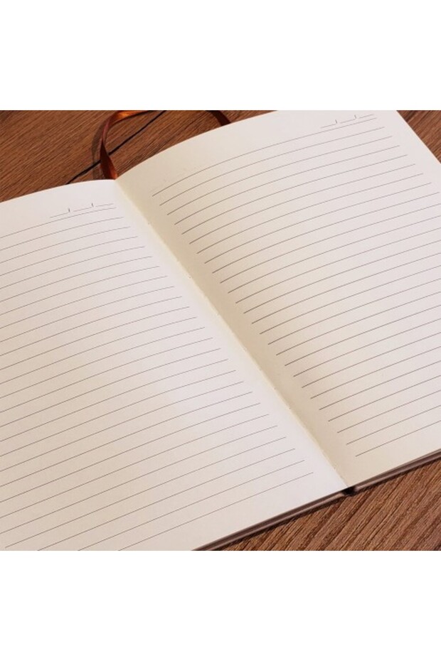 دفتر ملاحظات جلدي منقوش - 2