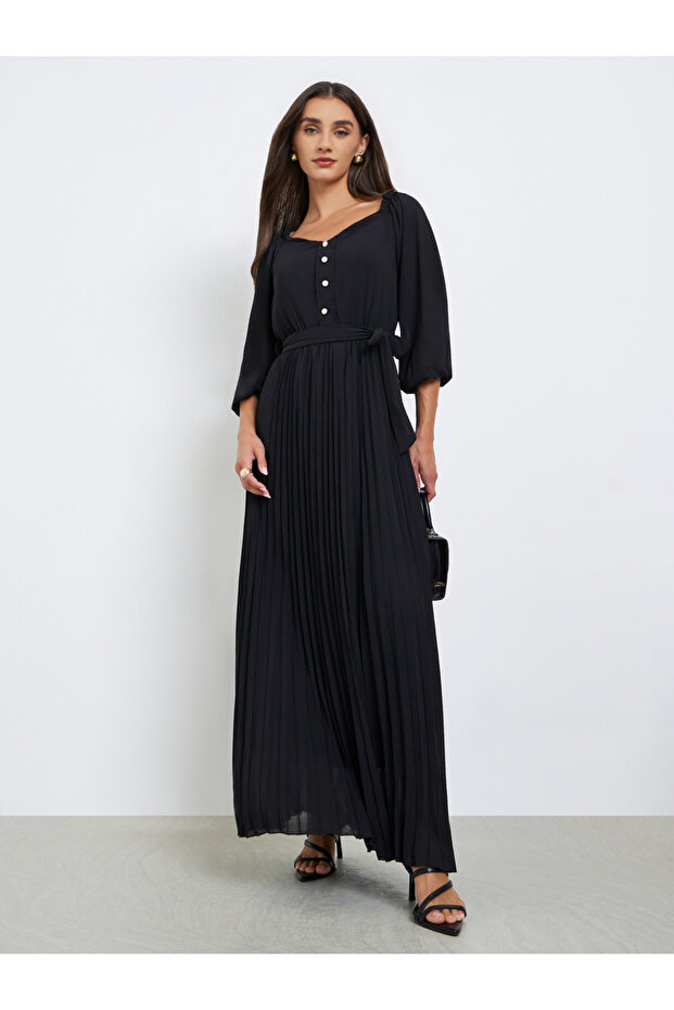 فستان ماكسي أسود سادة مطوي بأزرار - 1