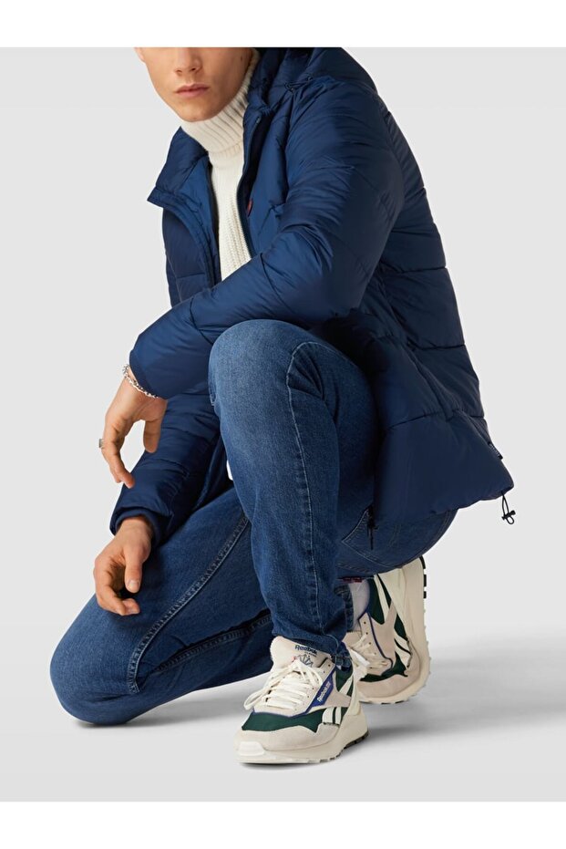 quilted jacket with label patch in dark blue - 1