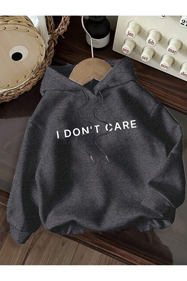 I Don'T Care Written Women's Oversized Hooded Sweatshirt