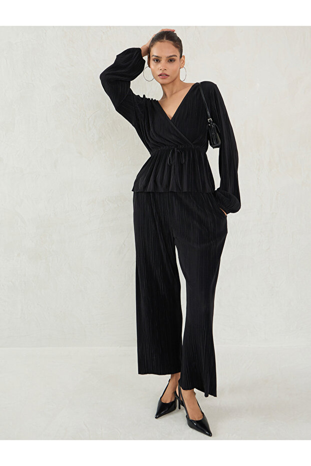 Black Balloon Sleeve Plisse Peplum Top