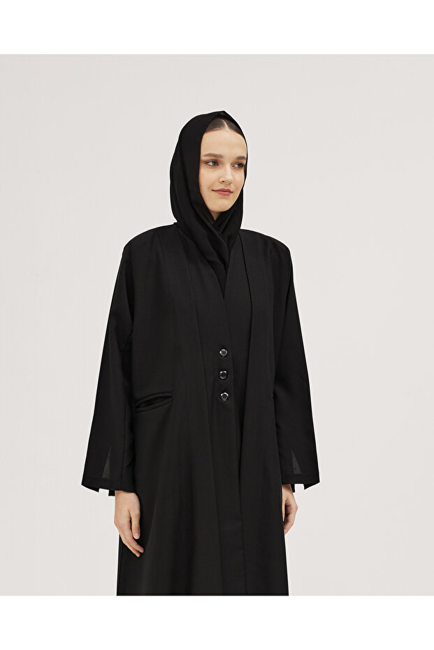 Practical flared linen abaya with front pockets and button-decorated collar - black