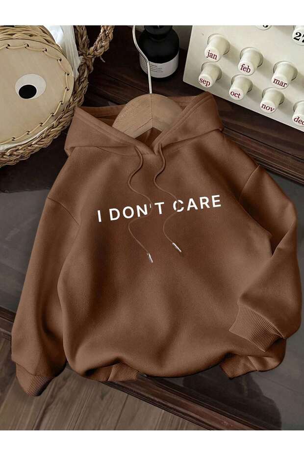 I Don'T Care Written Women's Oversized Hooded Sweatshirt