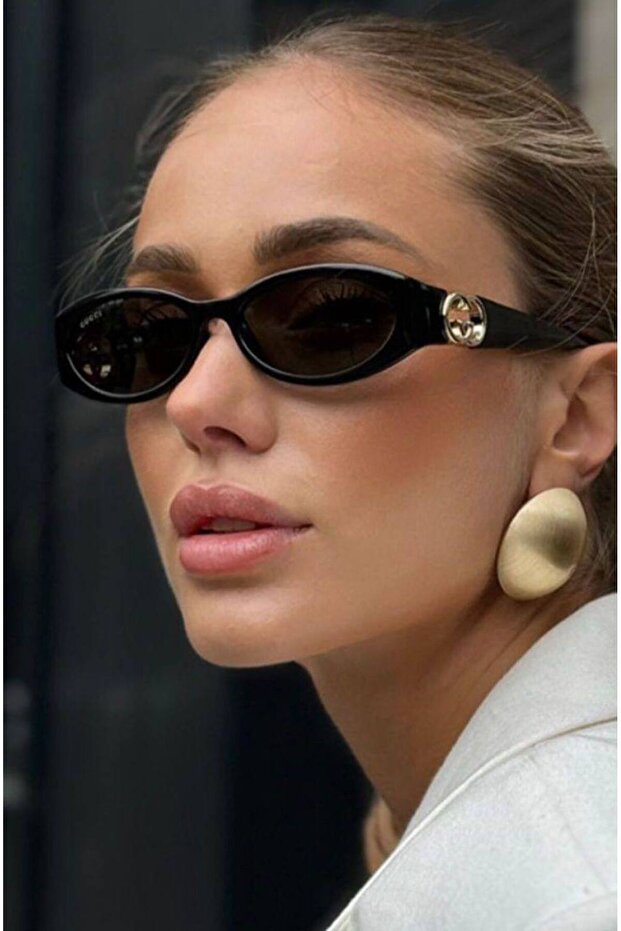 نظارات شمسية بإطار عظمي أسود - 1