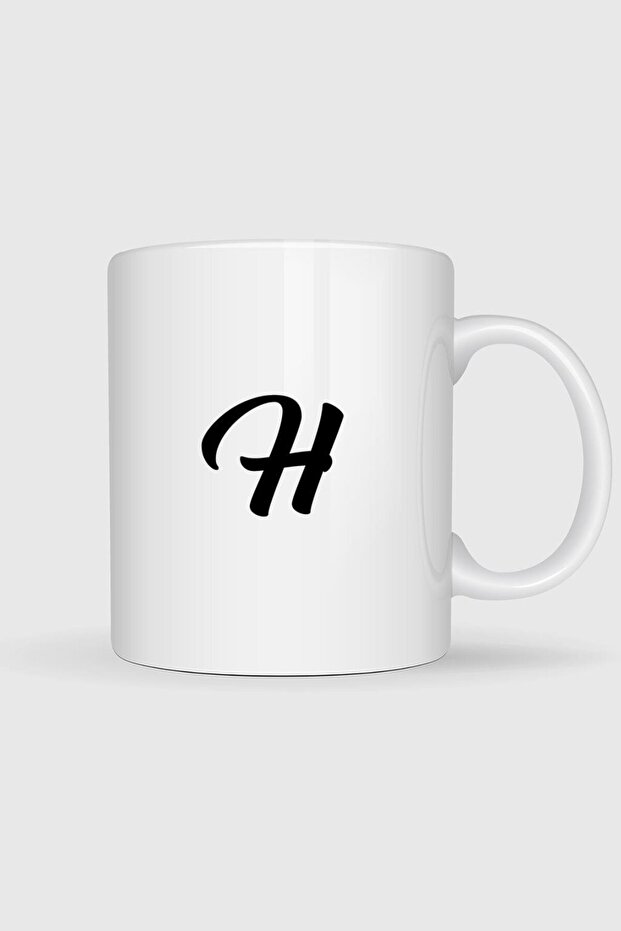 كوب بطبعة حرف H