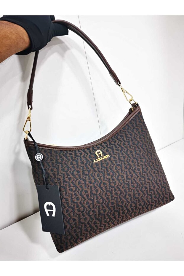 A brown patterned shoulder bag with a practical and stylish design, suitable for everyday use and outings. - 1