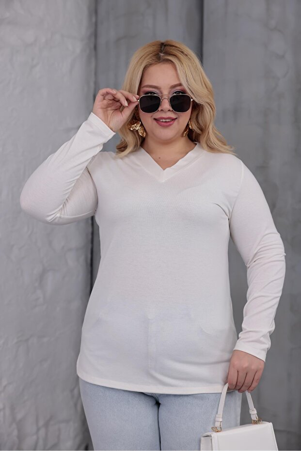 بلوزة كبيرة الحجم ذات رقبة على شكل حرف V - 4