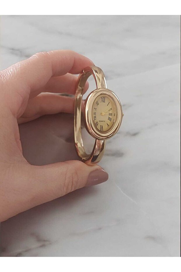 ÇELİK GOLD SAAT - 2