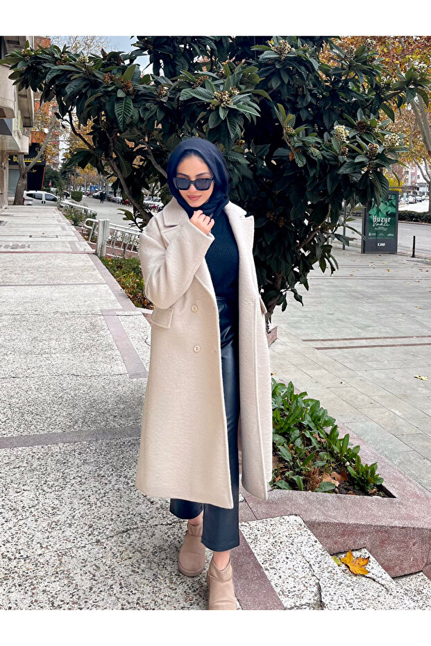 معطف طويل بأزرار وجيوب مع غطاء