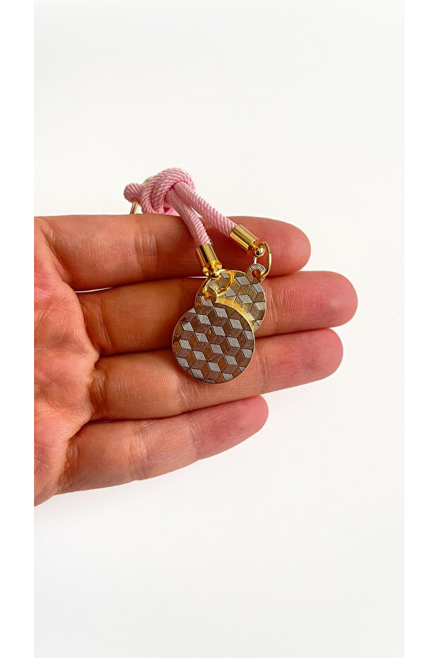 سلسلة مفاتيح على شكل عين دائرية باللون الوردي الفاتح - 5