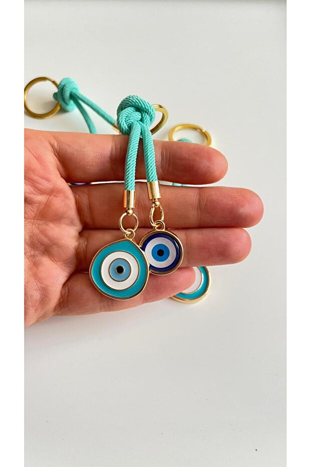 سلسلة مفاتيح بخرز أخضر اللون على شكل عين الحسد - 2