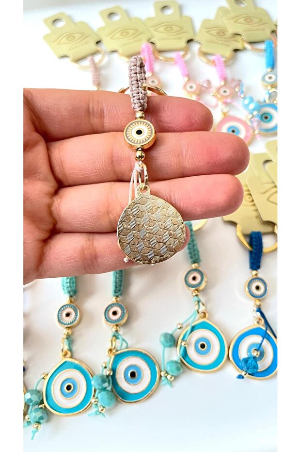 سلسلة مفاتيح على شكل عين الحسد باللون البيج - 3