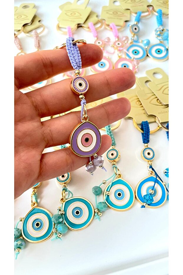سلسلة مفاتيح على شكل عين الحسد باللون الأرجواني - 4
