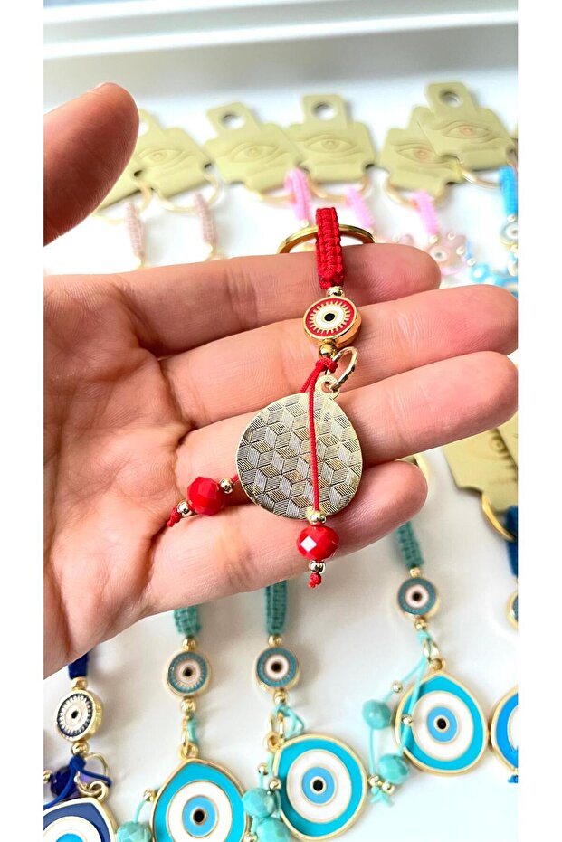 سلسلة مفاتيح على شكل عين الحسد بخيط أحمر - 2