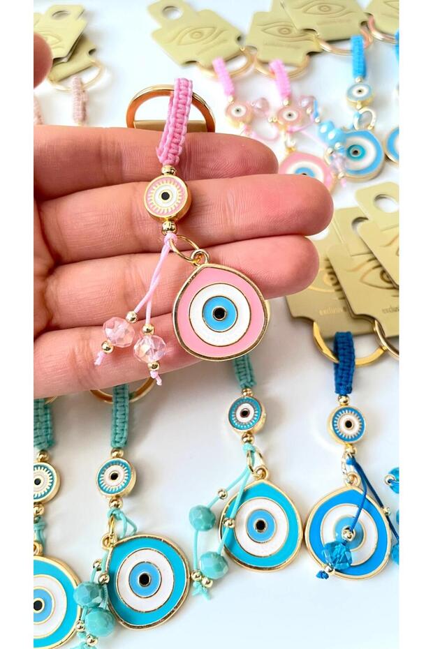 سلسلة مفاتيح على شكل عين الحسد باللون الوردي - 3