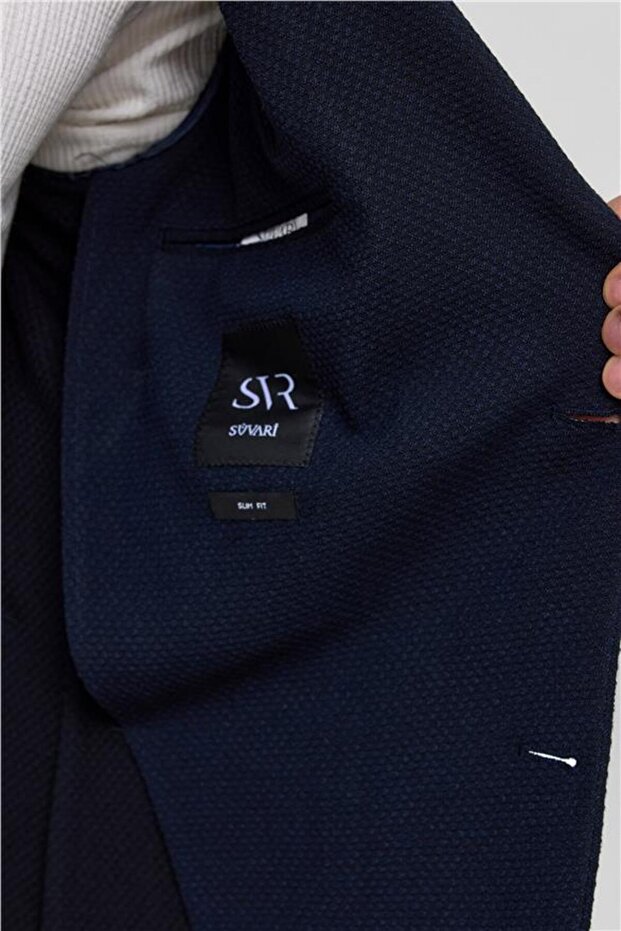 سترة مدببة ذات ياقة مدببة منقوشة باللون الأزرق الداكن 6 - 6