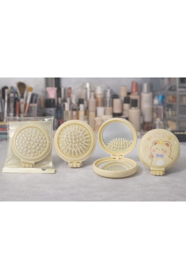 Figured Folding Comb and Mirror Purse Size