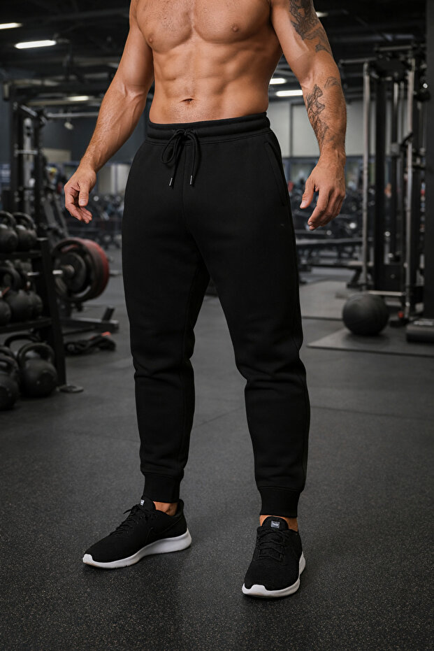 بنطال رياضي أسود للرجال من نوع JOGGER ذو تصميم بسيط - 1