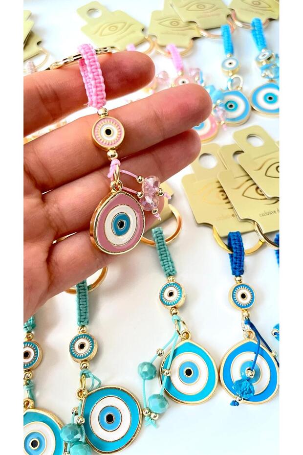 سلسلة مفاتيح على شكل عين الحسد باللون الوردي - 5