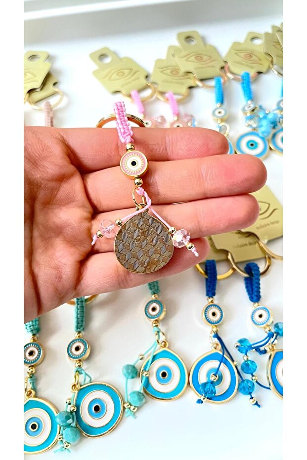 سلسلة مفاتيح على شكل عين الحسد باللون الوردي - 4