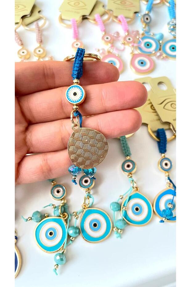 سلسلة مفاتيح على شكل عين الحسد بحبل فيروزي - 2