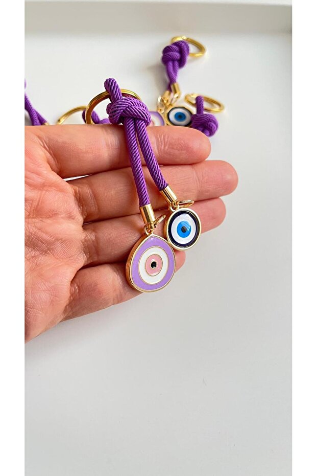 سلسلة مفاتيح على شكل عين الحسد مصنوعة من الخرز الأرجواني - 5