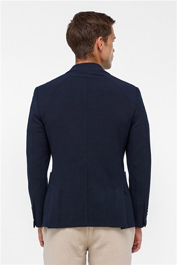 سترة مدببة ذات ياقة مدببة منقوشة باللون الأزرق الداكن 6 - 8