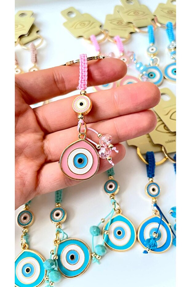 سلسلة مفاتيح على شكل عين الحسد باللون الوردي - 6