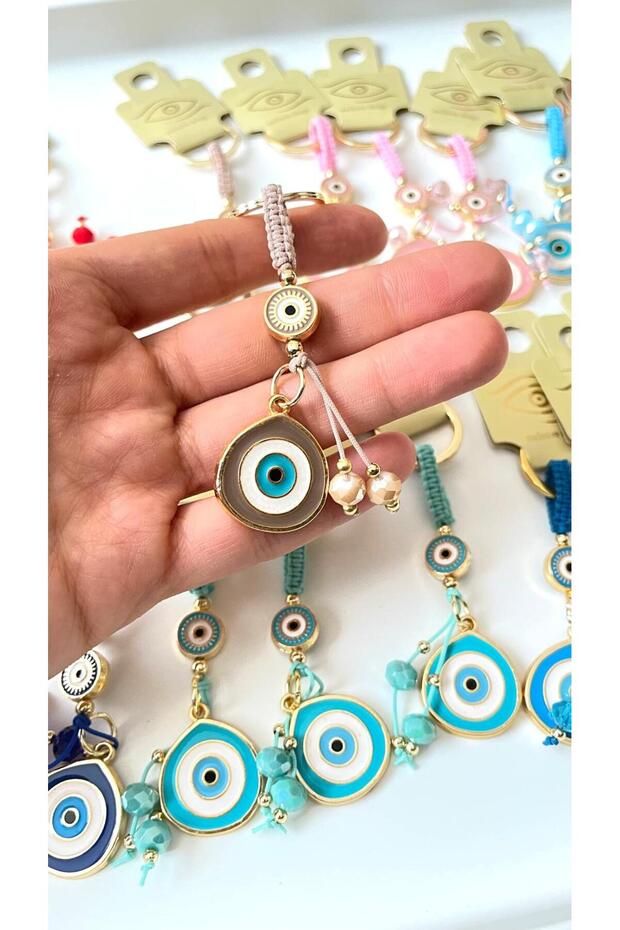 سلسلة مفاتيح على شكل عين الحسد باللون البيج - 6