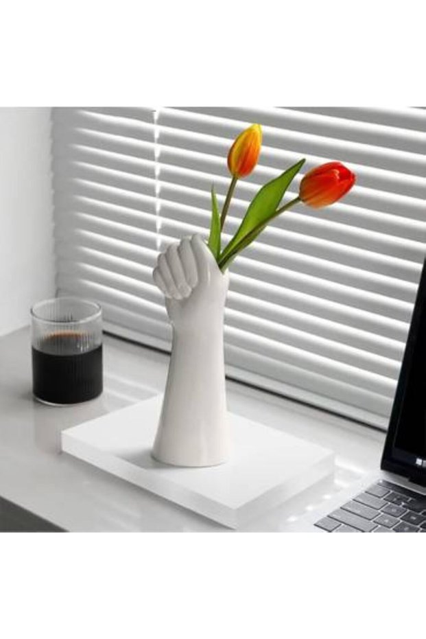 Ceramic vase as a decorative item, shaped like a hand fist. Measurements are shown in the pictures.