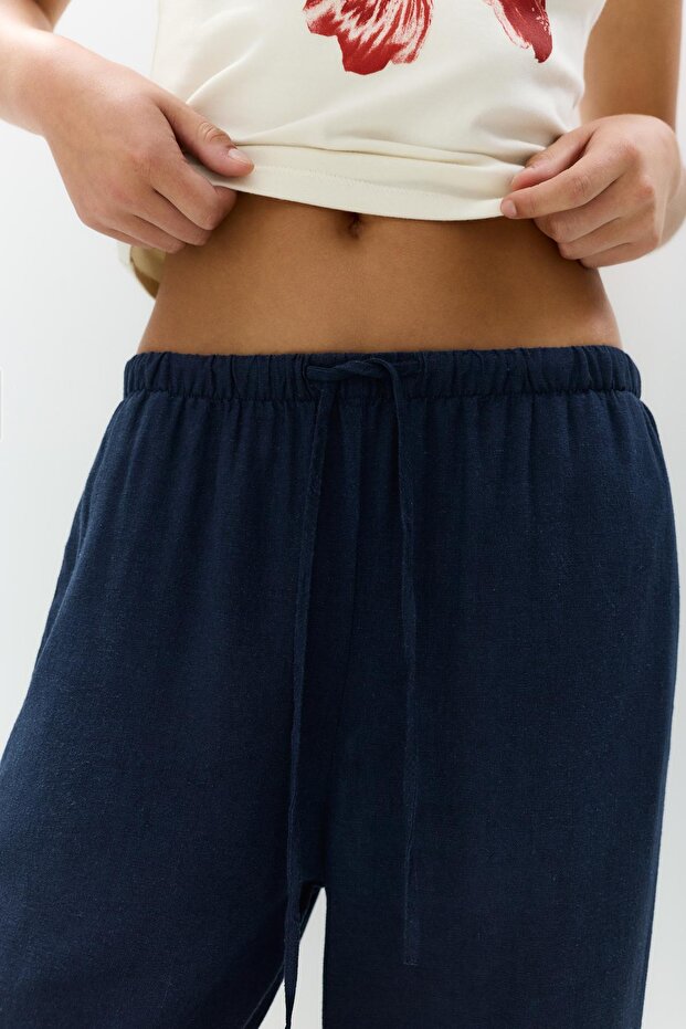 Dökümlü keten pantolon - 4