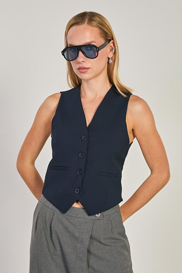 Women's buttoned flap pocket vest - navy blue