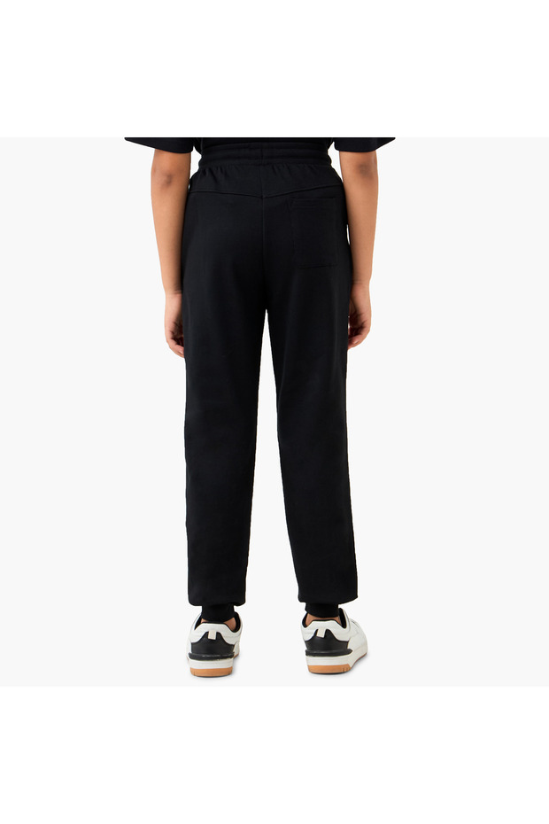 بنطال رياضي سادة بحزام خصر مطاطي وجيوب - 3