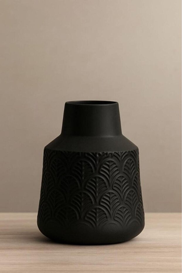Black ceramic vase with elegant patterns
