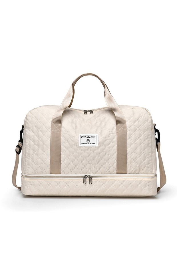 A new travel bag for short trips, featuring separate compartments for dry and wet items, and a separ - 1