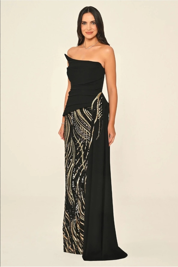 A long crepe dress embellished with sequins, featuring an asymmetrical design and a strapless top. - 2