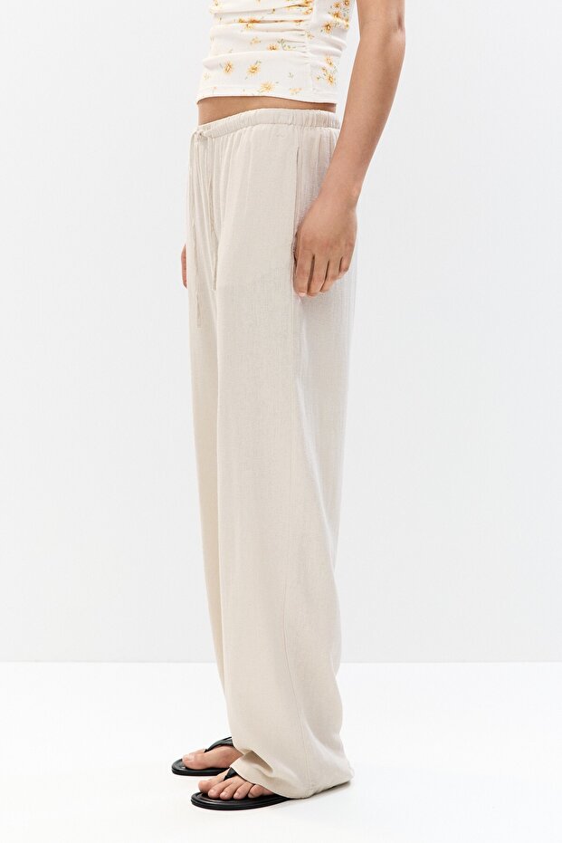 Dökümlü keten pantolon - 7