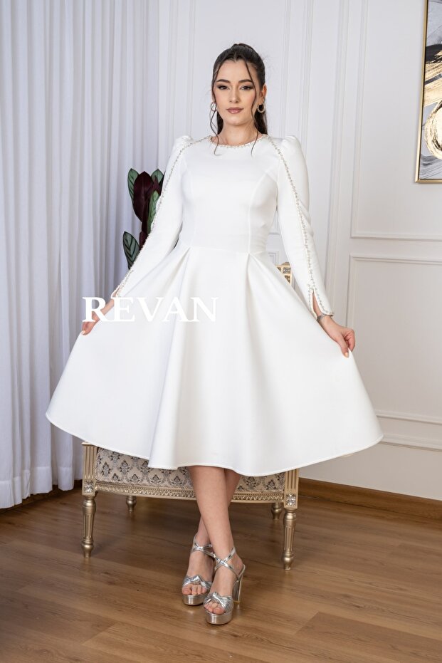 A soft dress with long sleeves and luxurious embroidery - 1
