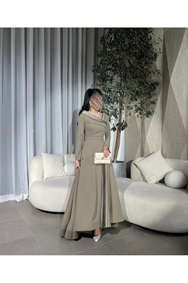 An elegant dress with a modern design that combines sophistication and modesty. - 3