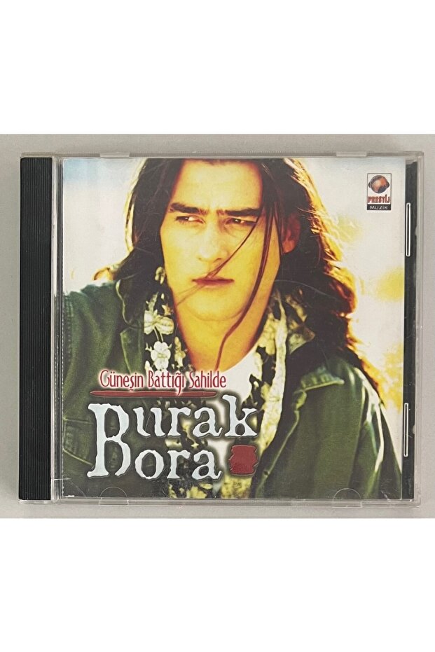Burak bora at the beach where the sun sets cd