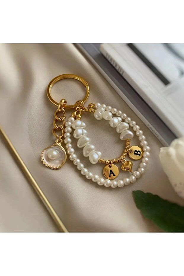 سلسلة مفاتيح على شكل حرفين من Oysters Charm