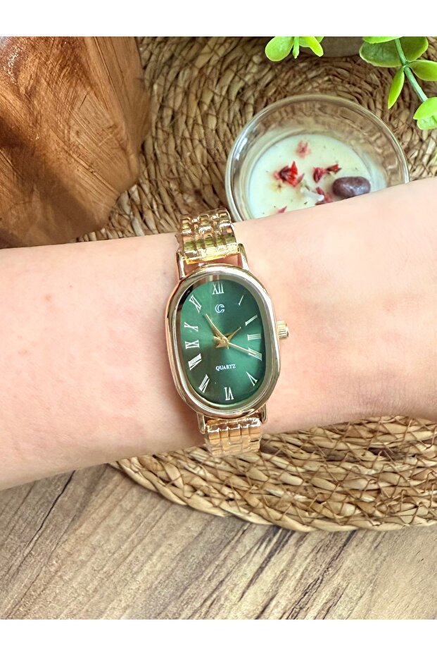 Oval Gold Inside Green Women Wrist Watch