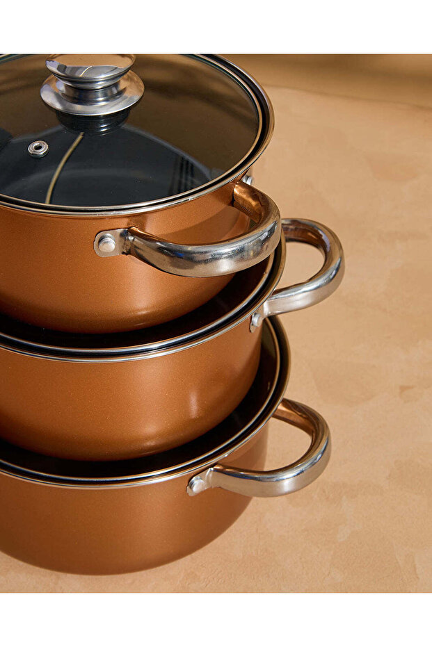 طقم أواني طهي دائرية بلون الصدأ (9 قطع) - 4