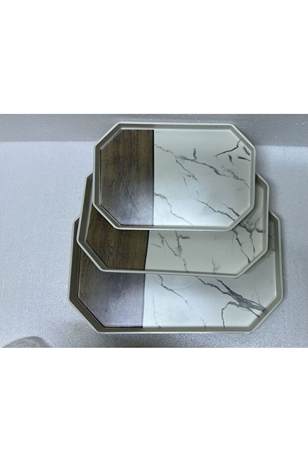 A set of trays of different sizes, melamine marble, for hospitality and serving