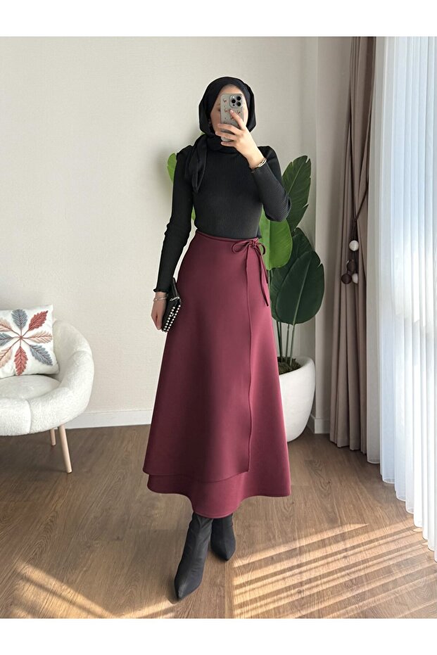 تنورة مربوطة بالخصر