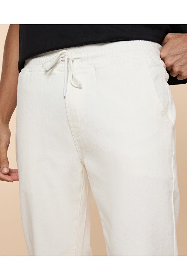 بنطال جينز رياضي سادة مع خصر برباط - 6