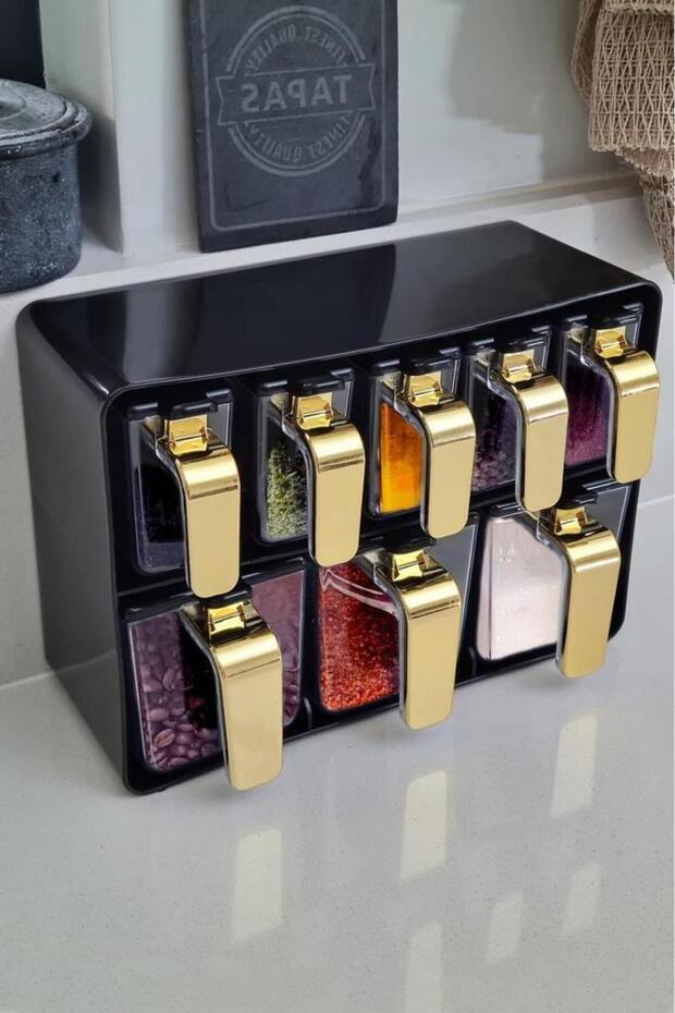 Eight-Piece Spice Rack Set with Gold Handles and Black Lid