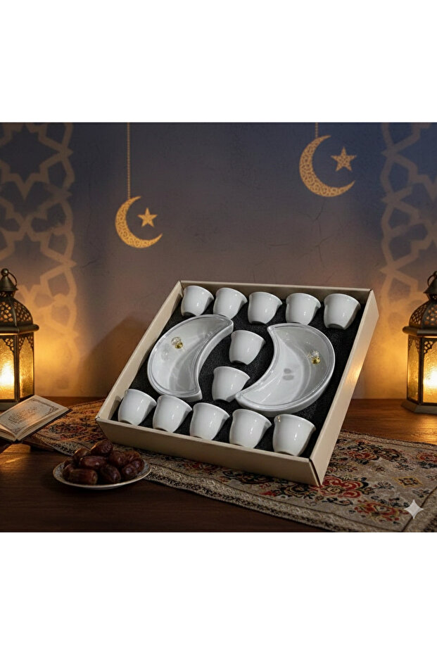 A luxurious Ramadan hospitality set consisting of 12 pristine white ceramic coffee cups and two serving saucers.