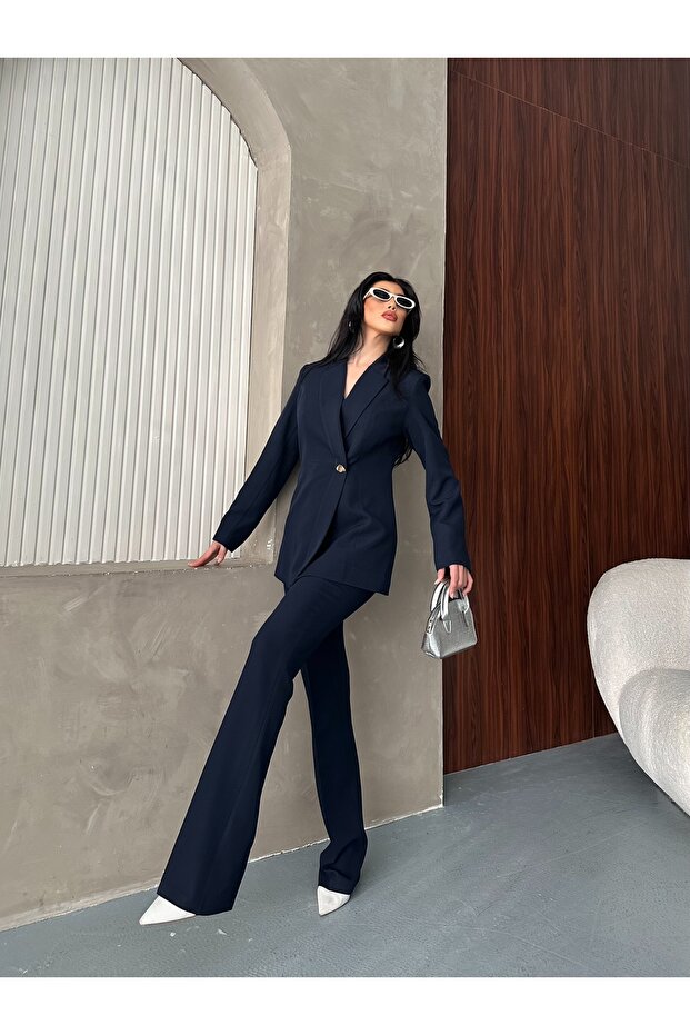 تصميم بدلة سترة وبنطلون غير متماثلة بزر واحد - 6