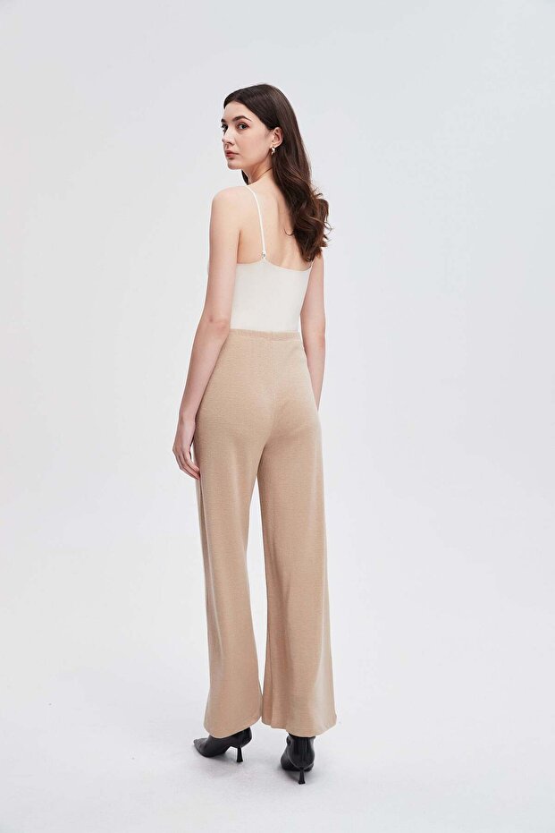 بنطال طويل واسع الساقين بلون موحد - 7